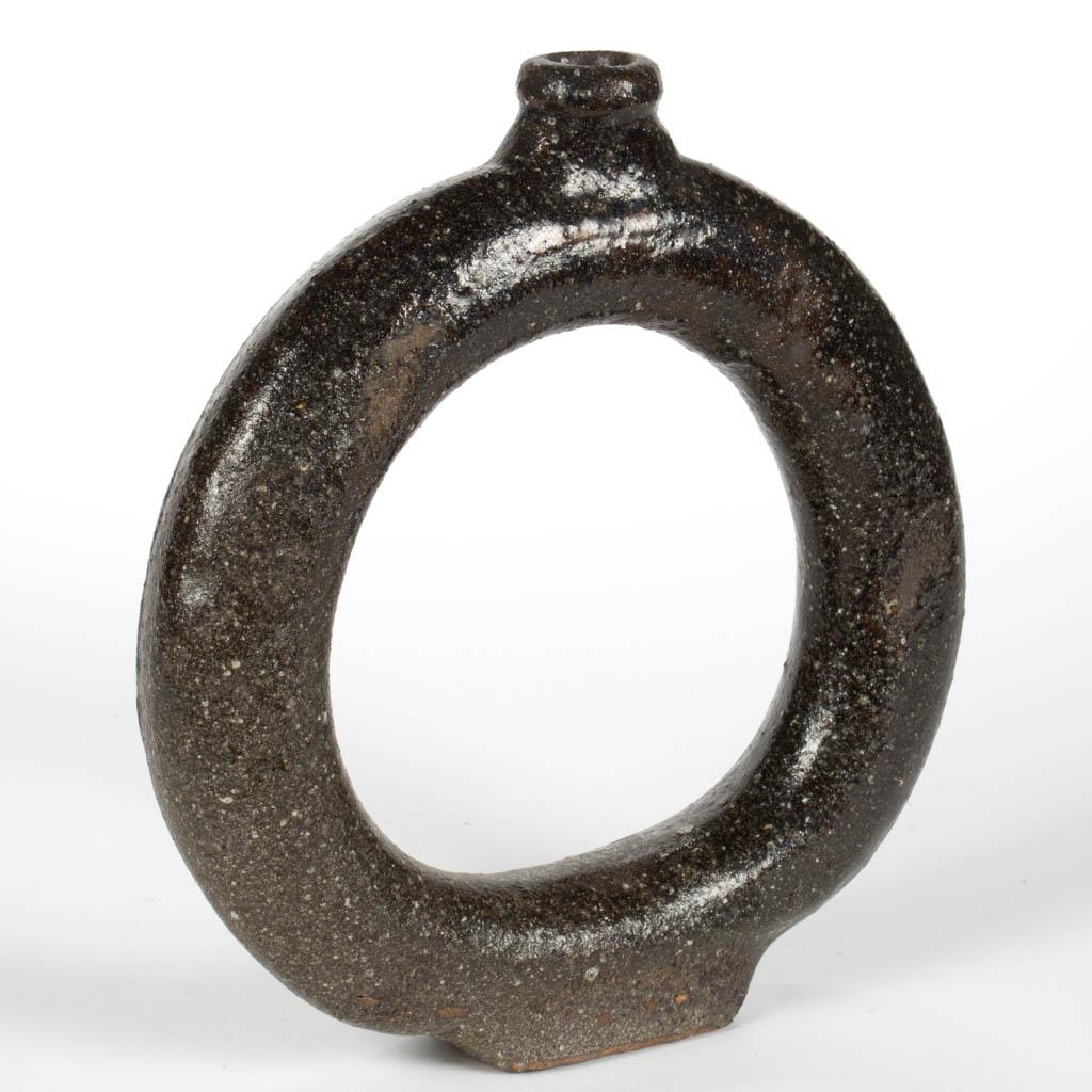 NORTH CAROLINA STONEWARE RING JUG / FLASK: NORTH CAROLINA STONEWARE RING JUG / FLASK, alkaline-glazed, having applied neck with rounded rectangular modest foot. Unmarked. Possibly Stone Family, Western North Carolina. Fourth quarter 19th/early
