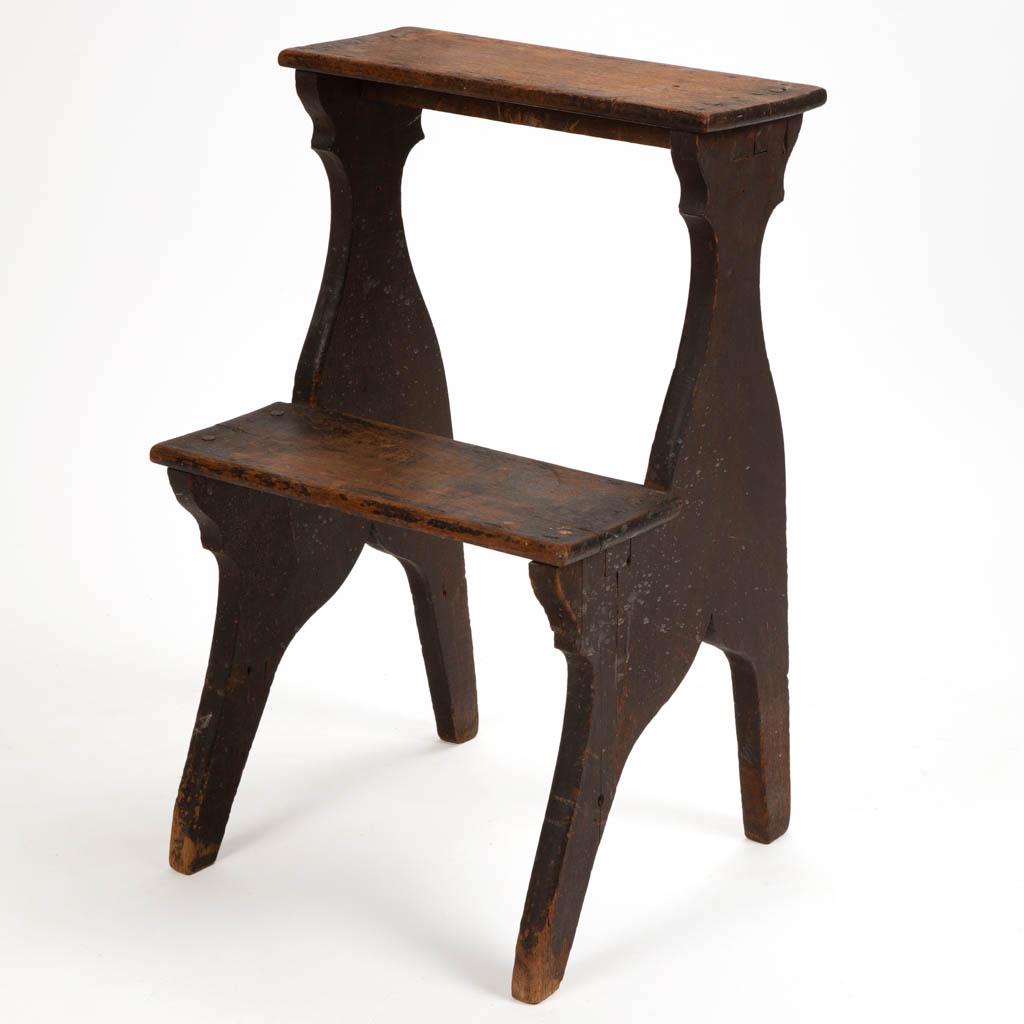 MID-ATLANTIC COUNTRY WALNUT BED STEPS: MID-ATLANTIC COUNTRY WALNUT BED STEPS, two-tiered steps, braces mortised to the underside, with cut-outs on the sides. Walnut secondary wood. Retains likely original varnished surface with warm color.