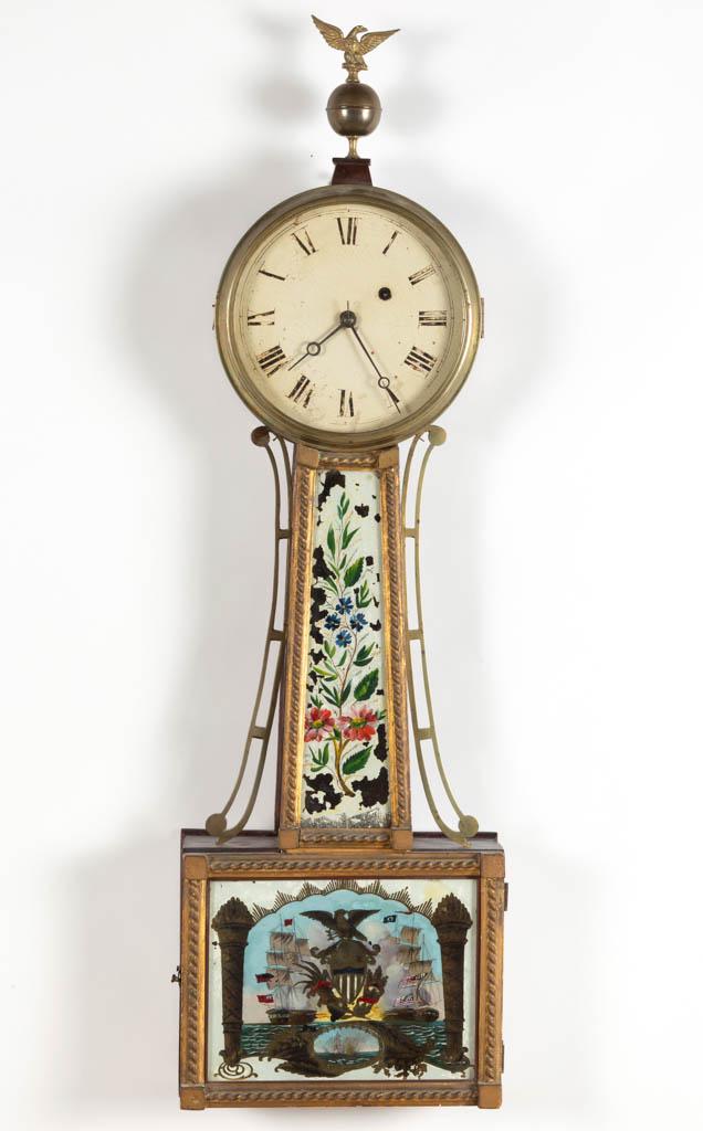 AMERICAN FEDERAL MAHOGANY BANJO CLOCK: AMERICAN FEDERAL MAHOGANY BANJO CLOCK, brass time only weight driven 8-day movement, having reverse-painted tablets, bottom tablet featuring a naval scene, mahogany case with pierced-brass side arms, 