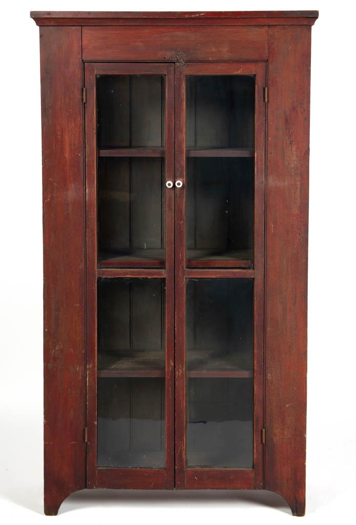 PENNSYLVANIA PAINTED POPLAR WALL PRESS: PENNSYLVANIA PAINTED POPLAR WALL PRESS, rectangular top with applied moldings to underside, case fitted with two doors surrounded by beading to case edges, each door set with two glass panes, conceali