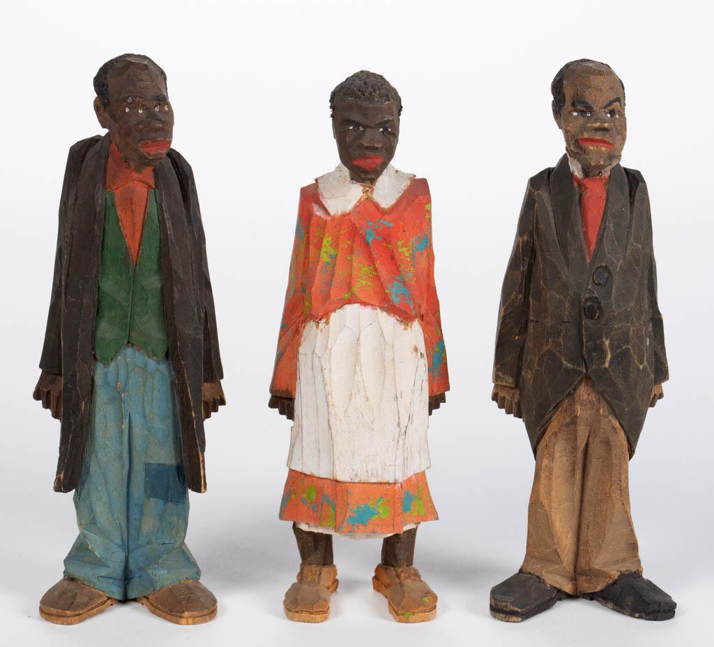 ADRIAN R. WOODALL (MISSOURI / FLORIDA, 1888-1969): ADRIAN R. WOODALL (MISSOURI / FLORIDA, 1888-1969) SOUTHERN BLACK AMERICANA FOLK ART CARVED AND PAINTED FIGURES, LOT OF THREE, depicting a preacher in a black coat, a woman in a colorful dress and whit