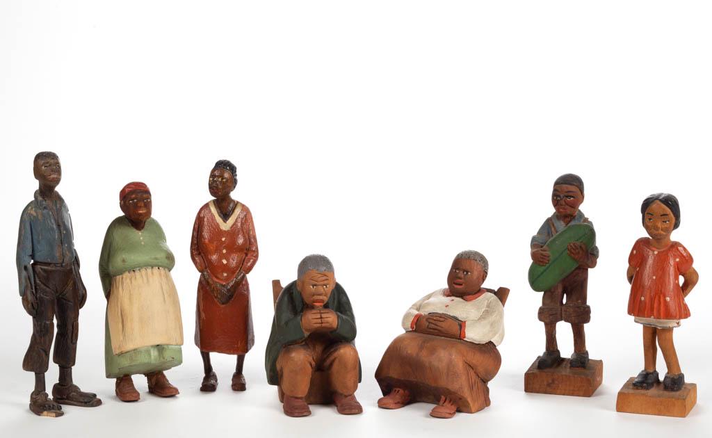 TOM BROWN (PLEASANT HILL, TENNESSEE, 1884-1947) FOLK: TOM BROWN (PLEASANT HILL, TENNESSEE, 1884-1947) FOLK ART CARVINGS, LOT OF SEVEN, including young boy with watermelon and a house maid. Original dry paint-decorated surface. Circa 1930. Maid 4 3/4" H. 