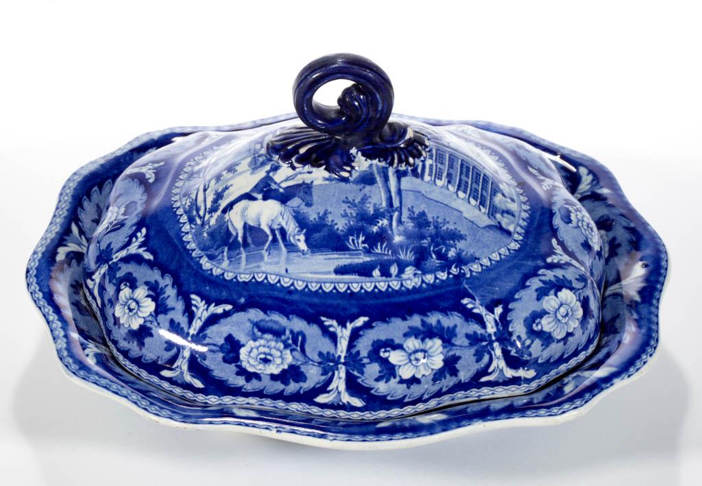 ENGLISH STAFFORDSHIRE PEARLWARE TRANSFER-PRINTED: ENGLISH STAFFORDSHIRE PEARLWARE TRANSFER-PRINTED AMERICAN HISTORICAL CERAMIC VEGETABLE DISH AND COVER, having dark blue transfer pattern depicting Mt. Vernon in background with a tall-masted ship to l