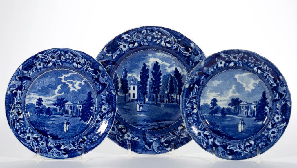 ENGLISH STAFFORDSHIRE PEARLWARE TRANSFER-PRINTED: ENGLISH STAFFORDSHIRE PEARLWARE TRANSFER-PRINTED AMERICAN VIEW CERAMIC PLATES, LOT OF THREE, each having dark blue transfer designs depicting manor homes in the countryside with figures in foreground