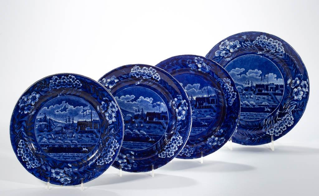 ENGLISH STAFFORDSHIRE PEARLWARE TRANSFER-PRINTED: ENGLISH STAFFORDSHIRE PEARLWARE TRANSFER-PRINTED AMERICAN HISTORICAL CERAMIC PLATES, LOT OF FOUR, each having dark blue transfer pattern depicting the "LANDING OF GEN. LA FAYETTE / At Castle Garden in