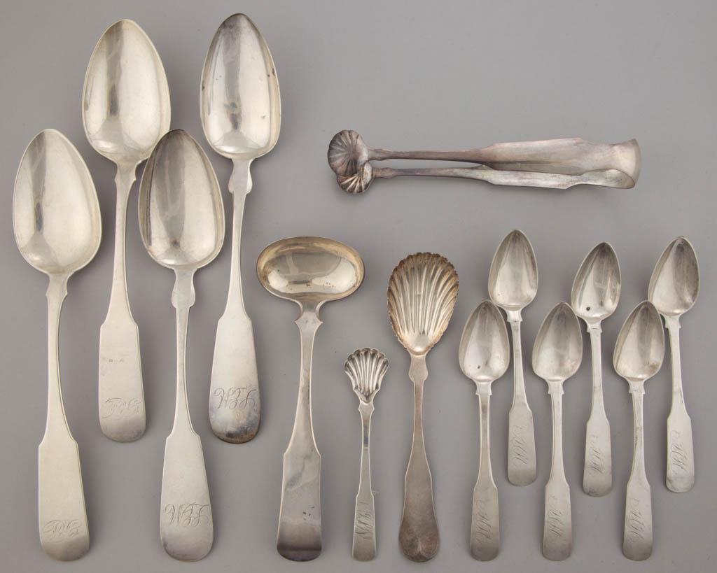 AMERICAN COIN SILVER SERVING UTENSILS AND SPOONS, LOT: AMERICAN COIN SILVER SERVING UTENSILS AND SPOONS, LOT OF 14, each with a fiddle handle having pointed shoulders, most with personalized engravings, comprising a pair of sugar tongs with shell grips an