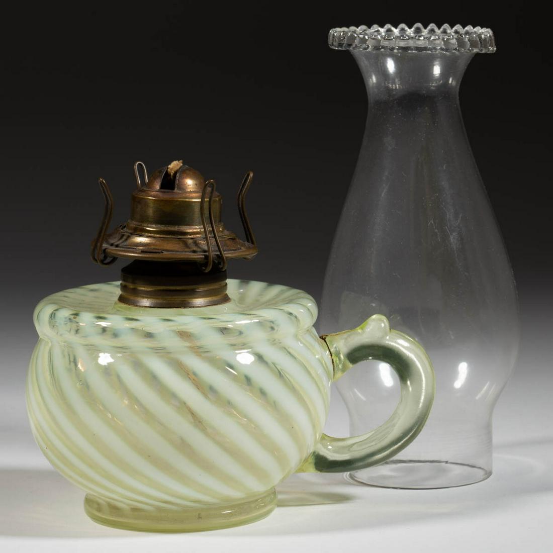 MIX AND MATCH / SWIRL KEROSENE FINGER LAMP: MIX AND MATCH / SWIRL KEROSENE FINGER LAMP, Vaseline opalescent (reacts under black light), molded handle, No. 1 Taplin-Brown collar. Fitted with a period setup comprising a No. 0 slip burner and a co