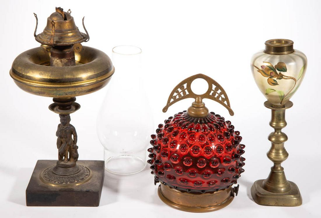 ASSORTED KEROSENE LIGHTING ARTICLES, LOT OF THREE: ASSORTED KEROSENE LIGHTING ARTICLES, LOT OF THREE, comprising a cranberry Hobnail hanging lamp font vase, a Panel-Optic peg lamp with polychrome-enamel decoration, fitted into a brass candlestick, and