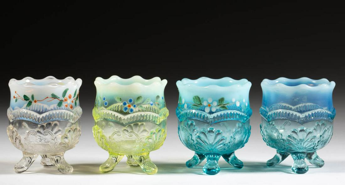 MANILA / WREATH AND SHELL TOOTHPICK HOLDERS, LOT OF: MANILA / WREATH AND SHELL TOOTHPICK HOLDERS, LOT OF FOUR, colorless opalescent, blue opalescent, and Vaseline (reacts under black light) opalescent, including three with polychrome-enamel decoration. 