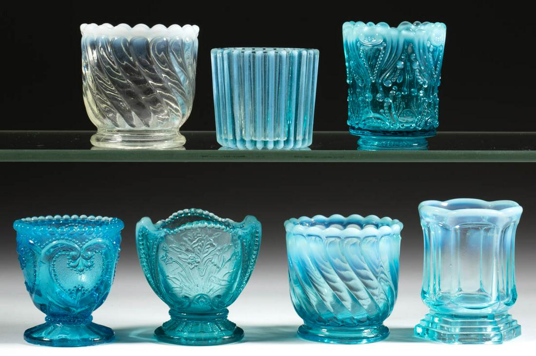 ASSORTED PRESSED OPALESCENT TOOTHPICK HOLDERS, LOT OF: ASSORTED PRESSED OPALESCENT TOOTHPICK HOLDERS, LOT OF SEVEN, colorless opalescent and blue opalescent, including a Beatty Rib, an Idyll, a Wild Bouquet, and a Jewelled Heart. Various makers. Late 19th
