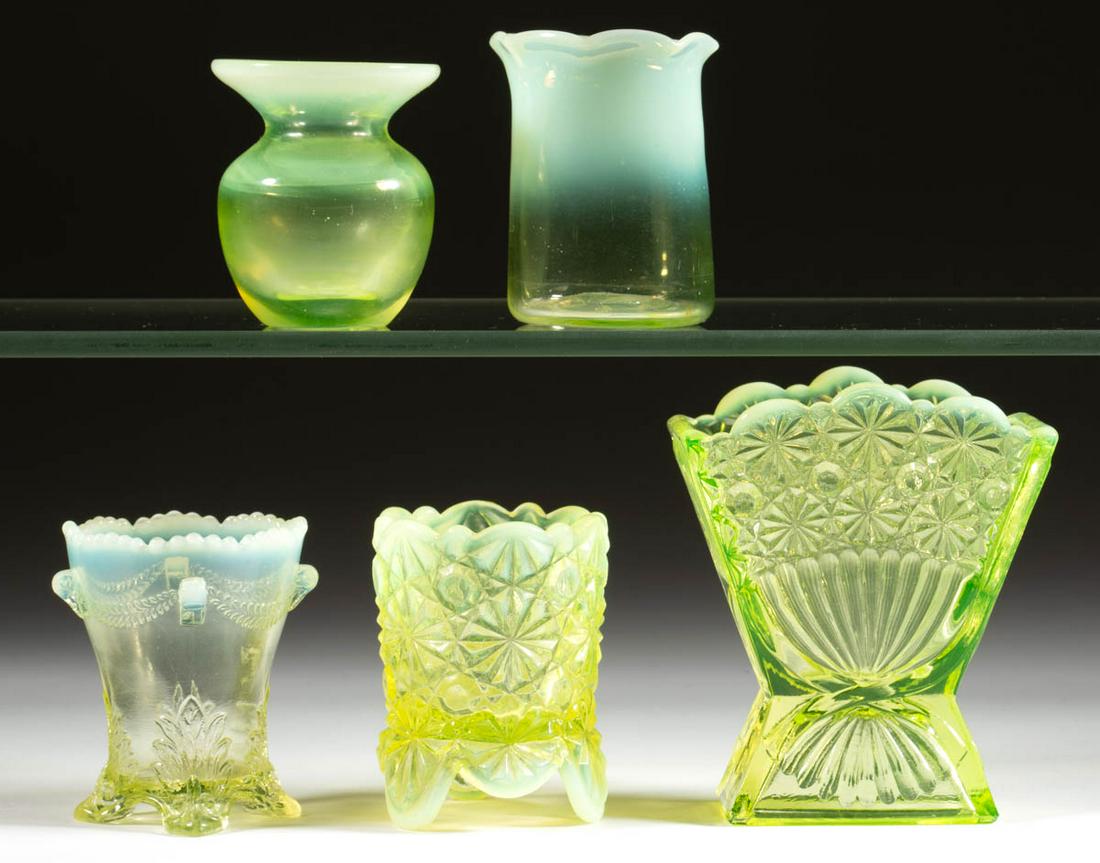ASSORTED VASELINE OPALESCENT GLASS TOOTHPICK HOLDERS,: ASSORTED VASELINE OPALESCENT GLASS TOOTHPICK HOLDERS, LOT OF FIVE, Vaseline (reacts under black light) opalescent, including a footed Daisy and Button, a Swag with Brackets, and a La Belle blown examp