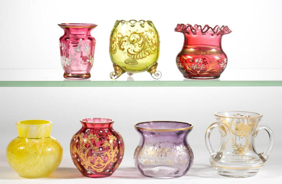 ASSORTED VICTORIAN ENAMEL-DECORATED TOOTHPICK HOLDERS,: ASSORTED VICTORIAN ENAMEL-DECORATED TOOTHPICK HOLDERS, LOT OF SEVEN, various colors, including a colorless with engraved and gilt-traced decoration, a yellow with opal spatter, and an amethyst with en