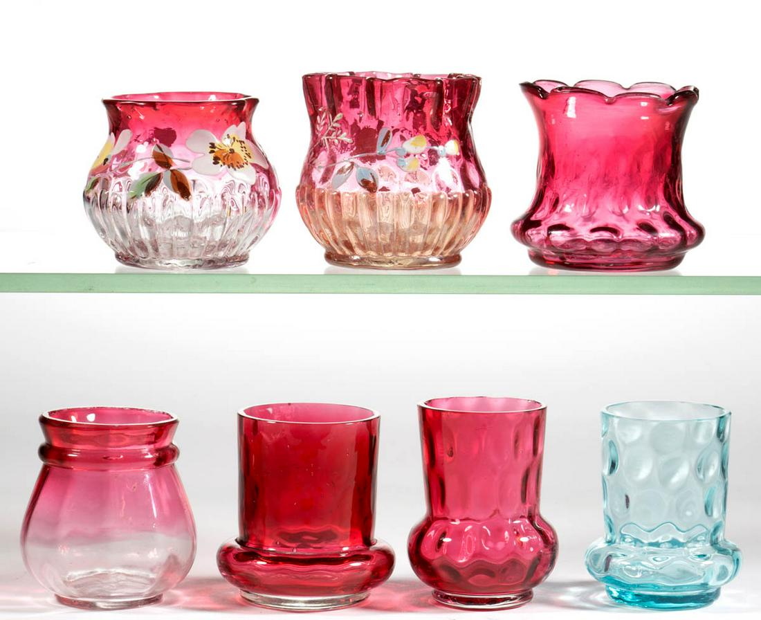 ASSORTED VICTORIAN GLASS TOOTHPICK HOLDERS, LOT OF: ASSORTED VICTORIAN GLASS TOOTHPICK HOLDERS, LOT OF SEVEN, cranberry, rubina, and blue, comprising four Spot-Optic, a Ring-Neck, and two Ribbon Overlay with each having polychrome-enamel decoration. Va