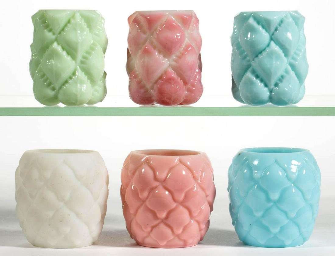 ASSORTED CONSOLIDATED TOOTHPICK HOLDERS, LOT OF SIX: ASSORTED CONSOLIDATED TOOTHPICK HOLDERS, LOT OF SIX, opaque colors of blue, shaded pink, and white with satin finish, comprising three Cone and three Pine Apple, factory ground/polished rims. Consolid