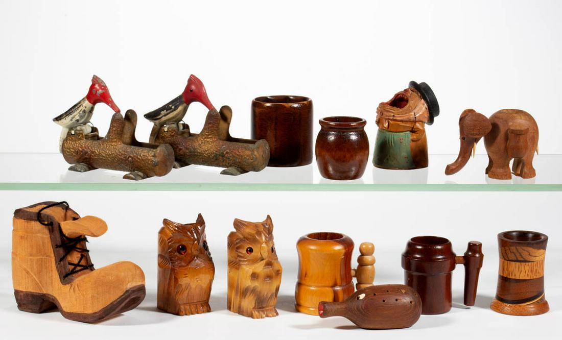 CARVED WOOD AND CAST-METAL TOOTHPICK / MATCH HOLDERS,: CARVED WOOD AND CAST-METAL TOOTHPICK / MATCH HOLDERS, LOT OF 13, including a multi-wood cylindrical example signed "S. H. Browning / 1985" to base, a carved wood shoe with yarn laces signed "J-BRAGG /