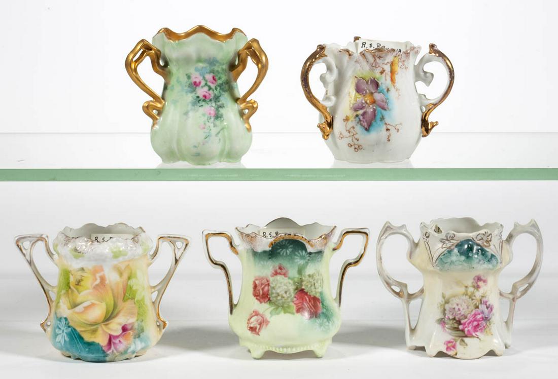 R.S. PRUSSIA PORCELAIN TOOTHPICK HOLDERS, LOT OF FIVE: R.S. PRUSSIA PORCELAIN TOOTHPICK HOLDERS, LOT OF FIVE, each having charming polychrome floral transfers with gilt highlights, including one Mold 525 example, one Mold 631 example, one Mold 502 example