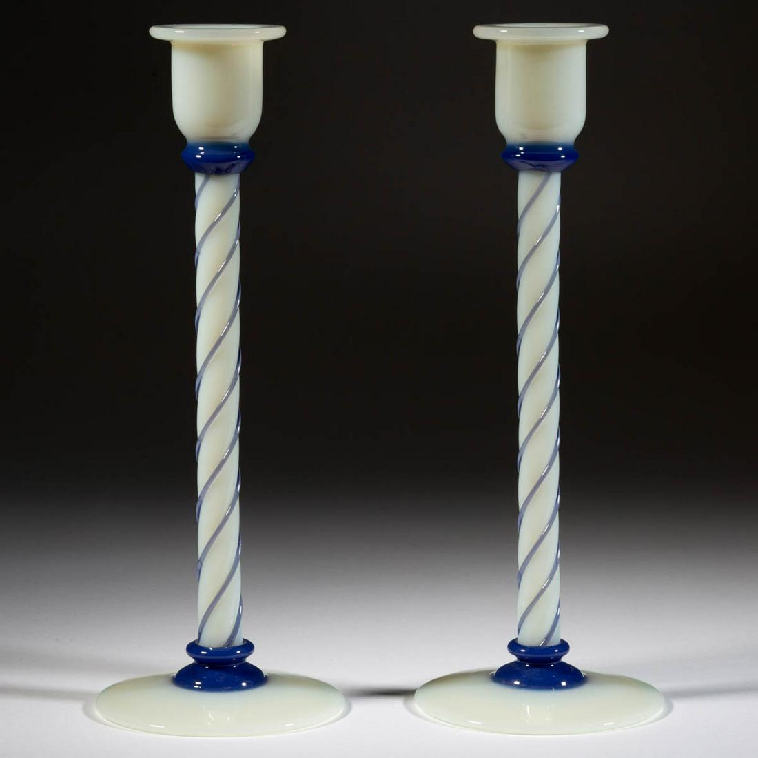 FRY FOVAL ART GLASS PAIR OF CANDLESTICKS: FRY FOVAL ART GLASS PAIR OF CANDLESTICKS, shape 1103, each with Delft threading and wafers, and polished pontil mark. H. C. Fry Glass Co. Circa 1922. 12" H.Undamaged.Literature: HCFGS - The Collector'