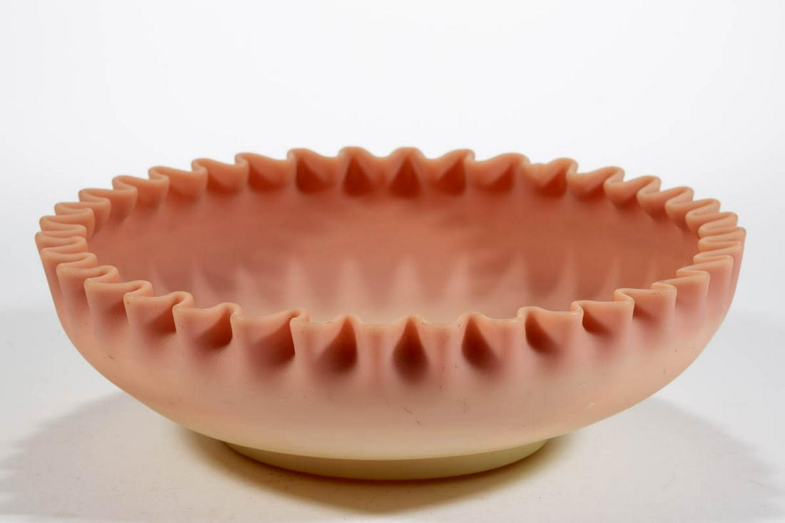 MT. WASHINGTON BURMESE CENTERPIECE BOWL: MT. WASHINGTON BURMESE CENTERPIECE BOWL, plush, shape 157, ruffled rim, polished pontil mark. Mt. Washington Glass Co. 1885-1895. 3" H, 9 1/2" DOA. Undamaged with some scattered surface wear. Provenan