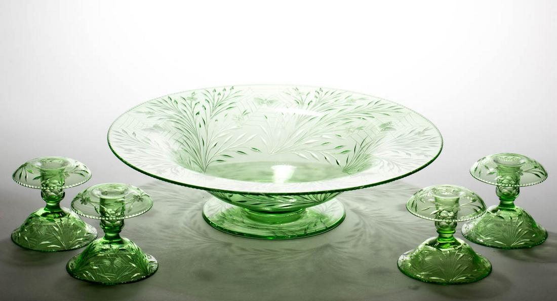 PAIRPOINT COLIAS CUT GLASS FIVE-PIECE CONSOLE SET: PAIRPOINT COLIAS CUT GLASS FIVE-PIECE CONSOLE SET, green, comprising a large footed console bowl and four shape 1640 candlesticks. Pairpoint Corporation. Circa 1925. Bowl: 4" H, 16" D rim. Candlestick