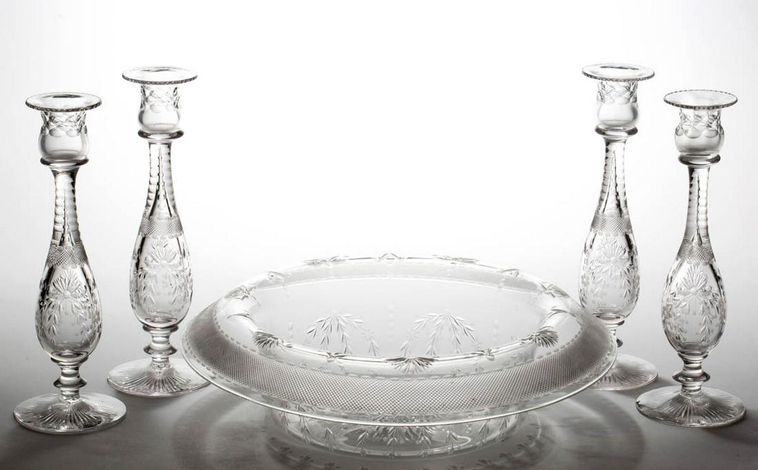 PAIRPOINT NOTTINGHAM PATTERN CUT GLASS FIVE-PIECE: PAIRPOINT NOTTINGHAM PATTERN CUT GLASS FIVE-PIECE CONSOLE SET, colorless, comprising a large console bowl with an overhanging rim and four matching candlesticks. Pairpoint Corporation. Circa 1925. Can
