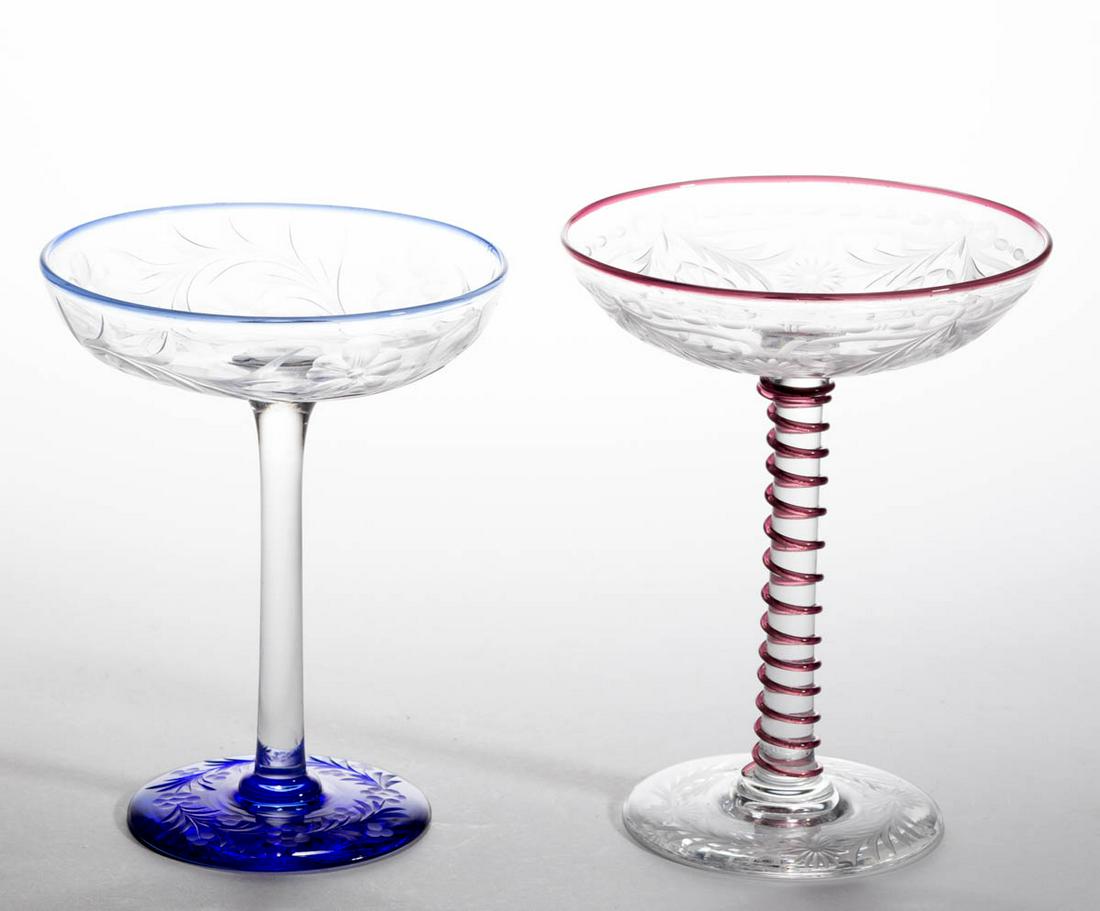 PAIRPOINT ATTRIBUTED ENGRAVED GLASS COMPOTES, LOT OF: PAIRPOINT ATTRIBUTED ENGRAVED GLASS COMPOTES, LOT OF TWO, colorless, comprising an example in the Waterford pattern with applied amethyst rim and swirling thread to the stem, and a Morgan pattern with