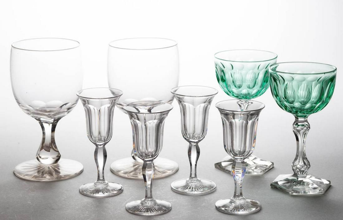 ASSORTED CUT GLASS DRINKING ARTICLES, LOT OF EIGHT: ASSORTED CUT GLASS DRINKING ARTICLES, LOT OF EIGHT, comprising a pair of Dorflinger Star Foot goblets, a pair of Val St. Lambert cut oval champagnes, and four Dorflinger Heavy Flute cordials. Late 19t