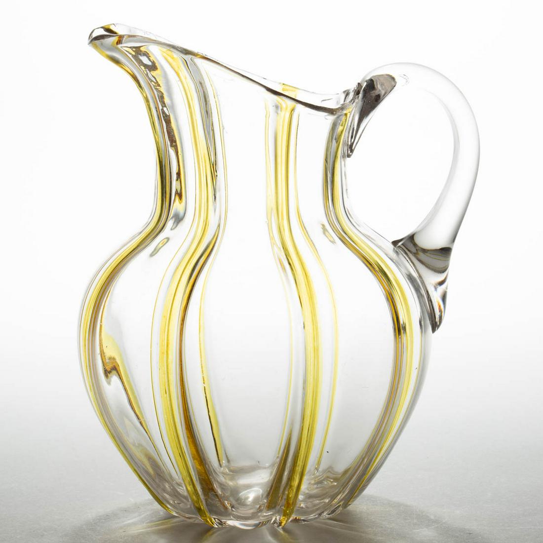HOBBS NO. 346 WATER PITCHER: HOBBS NO. 346 WATER PITCHER, colorless with yellow ribs, baluster-form, applied colorless handle, polished pontil mark. Hobbs, Brockunier & Co. Circa 1891. 9 1/4" H. Undamaged with moderate overall we