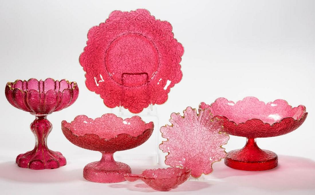 BOHEMIAN OVERSHOT ARTICLES, LOT OF SIX: BOHEMIAN OVERSHOT ARTICLES, LOT OF SIX, cranberry, comprising three compotes with scalloped rims, a plate with a scalloped rim, and two leaf-form dishes. Bohemia, now Czech Republic. Fourth quarter 19