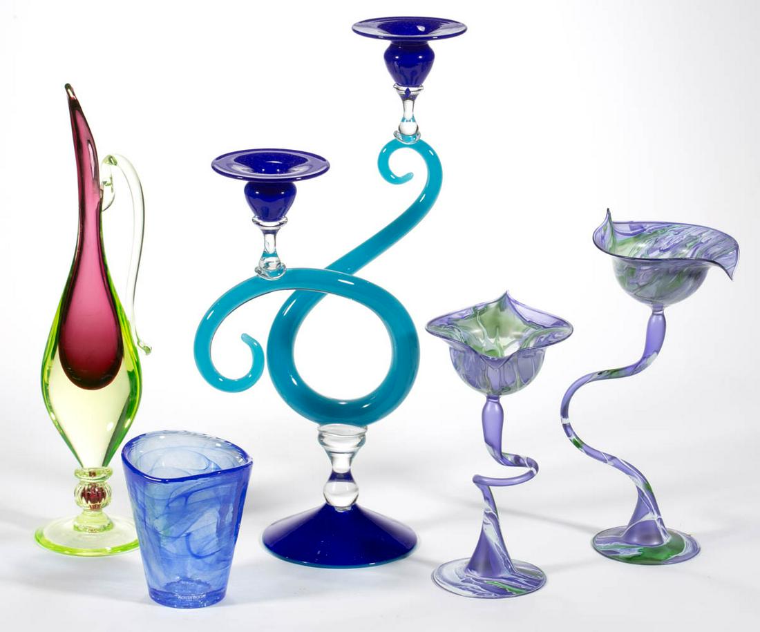 ASSORTED STUDIO ART GLASS ARTICLES, LOT OF FIVE: ASSORTED STUDIO ART GLASS ARTICLES, LOT OF FIVE, various colors, including a Kosta Boda blue swirled vase, a cranberry cased Vaseline (reacts under black light) ewer, and a Murano candelabra. Various 