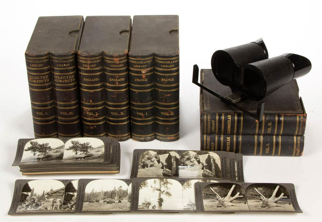 ANTIQUE KEYSTONE STEREOVIEWER AND CARDS: ANTIQUE KEYSTONE STEREOVIEWER AND CARDS, uncounted lot, retains four boxed sets, scenes include England, France, and various animal subjects, including an Alaskan view with sled dogs and cabins, a Yel