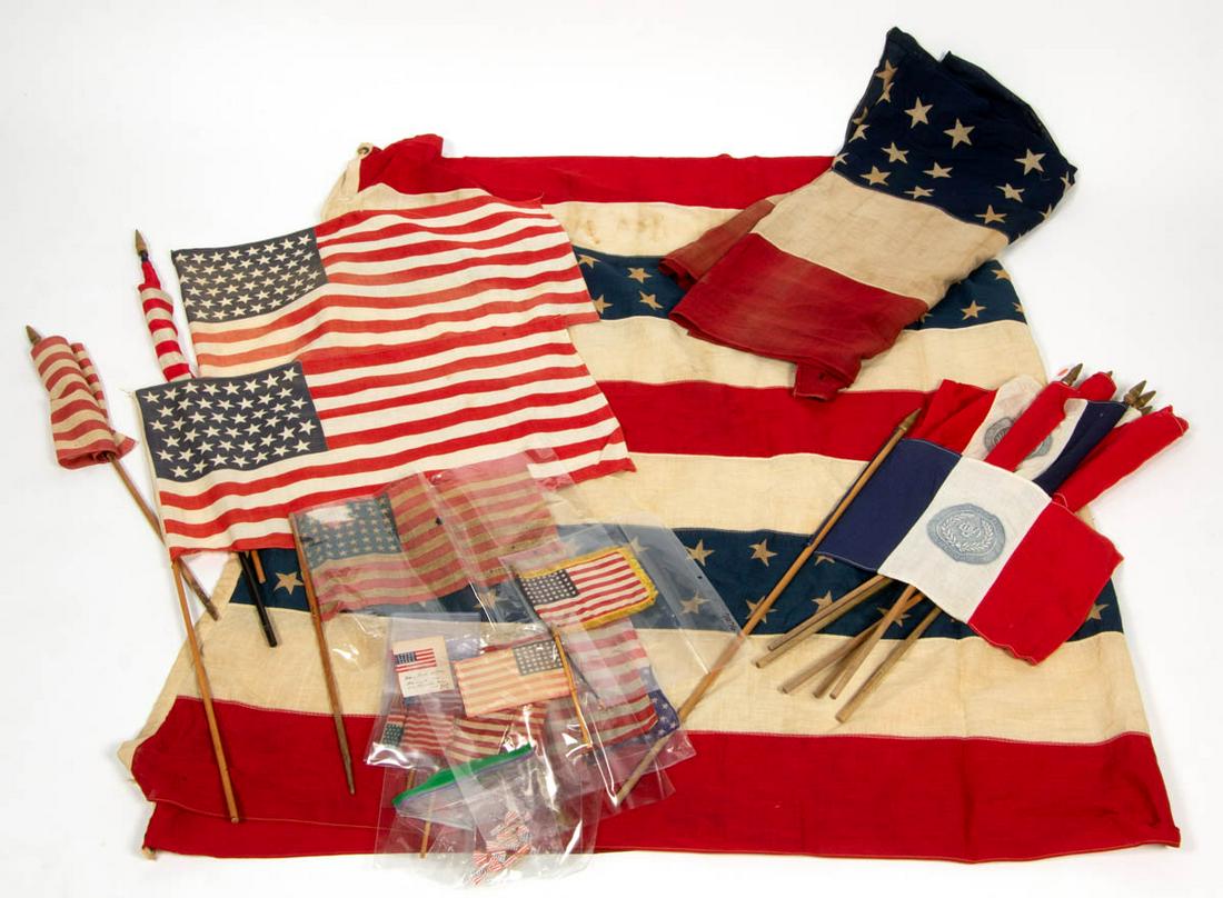 ASSORTED VINTAGE PATRIOTIC ARTICLES, UNCOUNTED LOT: ASSORTED VINTAGE PATRIOTIC ARTICLES, UNCOUNTED LOT, including printed cotton parade flags and bunting. 20th century. Longest flag 38 1/2" L. As-found condition with minor to heavy areas of wear and lo