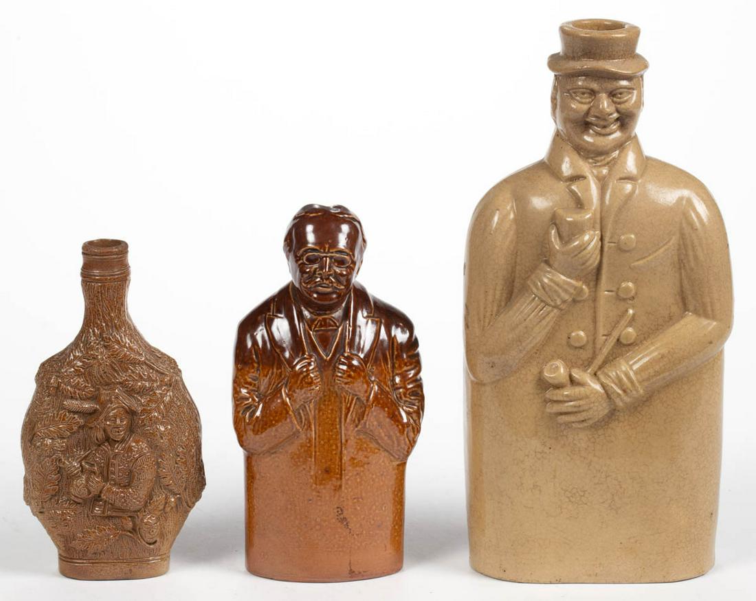 ENGLISH STONEWARE FLASKS, LOT OF THREE: ENGLISH STONEWARE FLASKS, LOT OF THREE, comprising two brown salt-glazed examples, including one molded as Arthur Balfour, First Earl of Balfour and Prime Minister of the United Kingdom (1902-1905), i