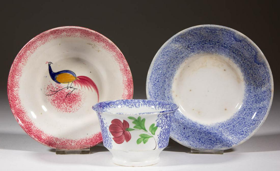 ENGLISH SPATTERWARE CERAMIC TEA ARTICLES, LOT OF THREE: ENGLISH SPATTERWARE CERAMIC TEA ARTICLES, LOT OF THREE, comprising a cup and saucer set with charming polychrome hand-painted flower motif and blue-sponged decoration and a 5 7/8" D saucer featuring p