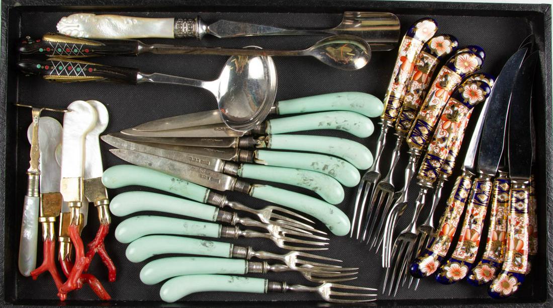 ENGLISH AND OTHER FLATWARE AND UTENSILS, LOT OF 31: ENGLISH AND OTHER FLATWARE AND UTENSILS, LOT OF 31, comprising a "Traditional Imari" set of six fruit forks and five fruit knives by Royal Crown Derby with ceramic handles, a 12-piece set of fruit for