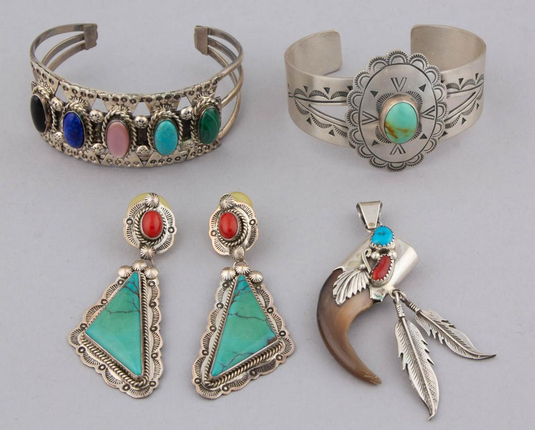 NAVAJO NATIVE AMERICAN STERLING SILVER JEWELRY, LOT OF: NAVAJO NATIVE AMERICAN STERLING SILVER JEWELRY, LOT OF FIVE PIECES, each with one or more stones cabochons, comprising two cuff bracelets with "R.M.J." marks for Robert M. Johnson, a pair of post-back