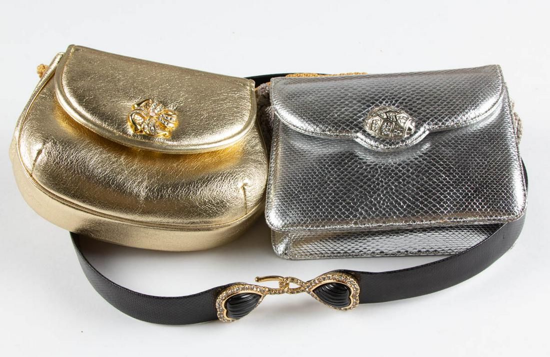 JUDITH LEIBER NEW YORK DESIGNER ACCESSORIES, LOT OF: JUDITH LEIBER NEW YORK DESIGNER ACCESSORIES, LOT OF THREE, comprising a black leather belt with a double heart clasp to front being adjustable in size, a small gold-toned purse with pink satin interio