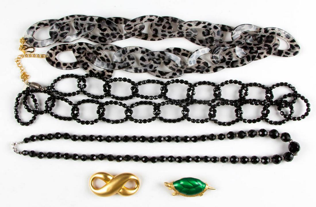 GIVENCHY AND OTHER DESIGNER JEWELRY, LOT OF FIVE: GIVENCHY AND OTHER DESIGNER JEWELRY, LOT OF FIVE, comprising three pieces by Givenchy consisting of a black faceted bead necklace, an infinity symbol brooch, and an enameled turtle brooch, a plastic l