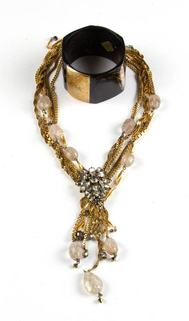 ASHLEY PITTMAN AND ERICKSON BEAMON DESIGNER JEWELRY,: ASHLEY PITTMAN AND ERICKSON BEAMON DESIGNER JEWELRY, LOT OF TWO, comprising a horn bangle bracelet with two applied gold-toned hammered metal panels by Ashley Pittman Kenya, and a multi-chain necklace