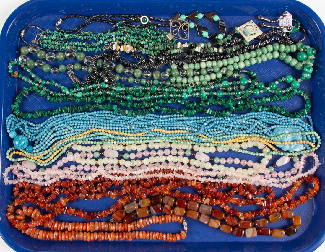 VINTAGE / CONTEMPORARY STONE JEWELRY, LOT OF 24 PIECES: VINTAGE / CONTEMPORARY STONE JEWELRY, LOT OF 24 PIECES, comprising 20 beaded necklaces, a pair of hematite drop earrings with post backs, a carved hematite ring, and a beaded malachite ring, stones in
