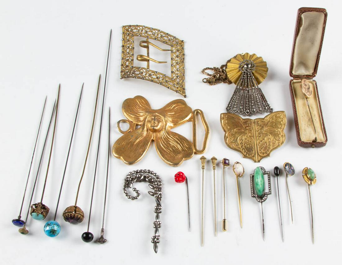 ANTIQUE AND VINTAGE HAT PINS AND OTHER ARTICLES, LOT OF: ANTIQUE AND VINTAGE HAT PINS AND OTHER ARTICLES, LOT OF 22, including several hat and stick pins with glass tops, one hat pin with sterling top, an Art Nouveau-style gilt cast-metal belt buckle, and a
