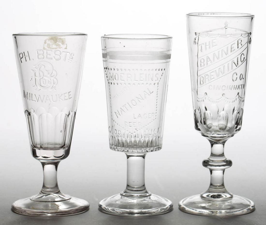 ASSORTED BREWERY ADVERTISING DRINKING GLASSES, LOT OF: ASSORTED BREWERY ADVERTISING DRINKING GLASSES, LOT OF THREE, comprising two Cincinnati, for The Banner Brewing Co., and Moerleins National Lager Beer, and Ph. Bests, Milwaukee. Circa 1900. 6 1/2" to 7
