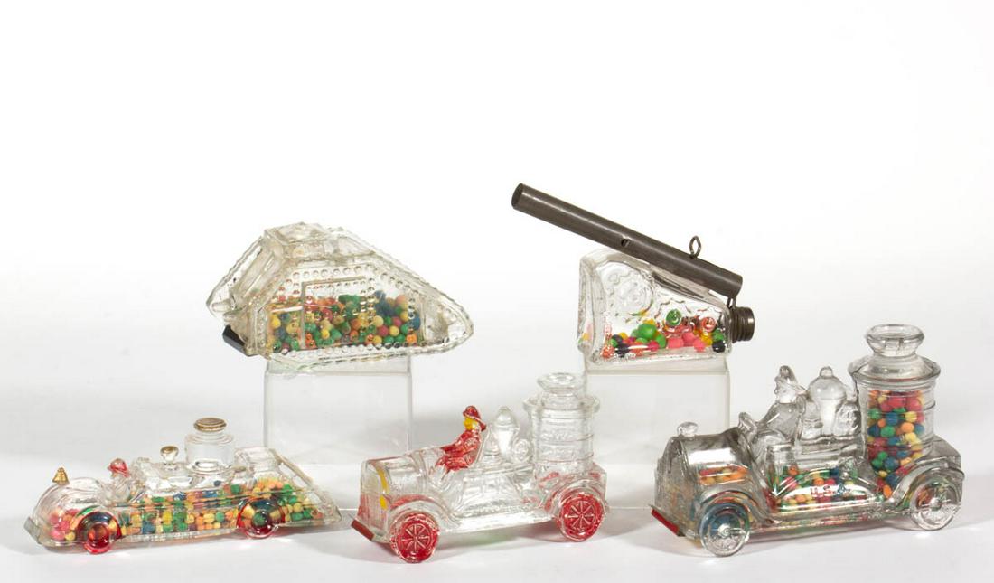 ASSORTED FIGURAL GLASS CANDY CONTAINERS, LOT OF FIVE: ASSORTED FIGURAL GLASS CANDY CONTAINERS, LOT OF FIVE, colorless, two with partial paint, including Fire Engine - Large Boiler #1, Fire Engine - V. G. CO. Little Boiler, and Cannon - US Defense Field G