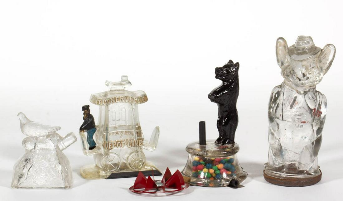 ASSORTED FIGURAL GLASS CANDY CONTAINERS, LOT OF FOUR: ASSORTED FIGURAL GLASS CANDY CONTAINERS, LOT OF FOUR, colorless, two with paint, one possibly later, comprising Bear on Circus Tub, Bird on Mound (lacking whistle), Rabbit Wearing Hat, and "TOONERVILL