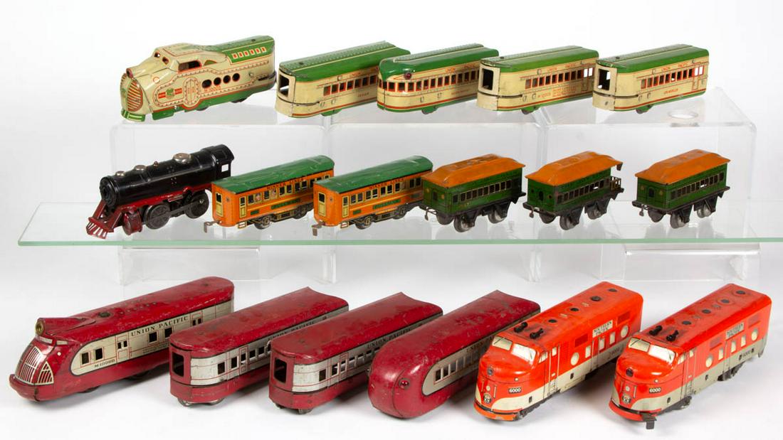 ASSORTED VINTAGE TIN TRAIN TOYS, LOT OF 17: ASSORTED VINTAGE TIN TRAIN TOYS, LOT OF 17, including a Marx Overland Union Pacific incomplete set and two pre-war Lionel Winner lines coaches. Second quarter 20th century. Lionel Winner Lines coach 7