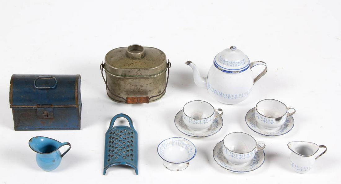 ASSORTED CHILDREN'S ENAMEL AND TIN TOYS, LOT OF 13: ASSORTED CHILDREN'S ENAMEL AND TIN TOYS, LOT OF 13, including tea kettle, three cup and saucers, and grater. Late 19th/early 20th century. Grater 4" L.Very good overall condition, each with scattered