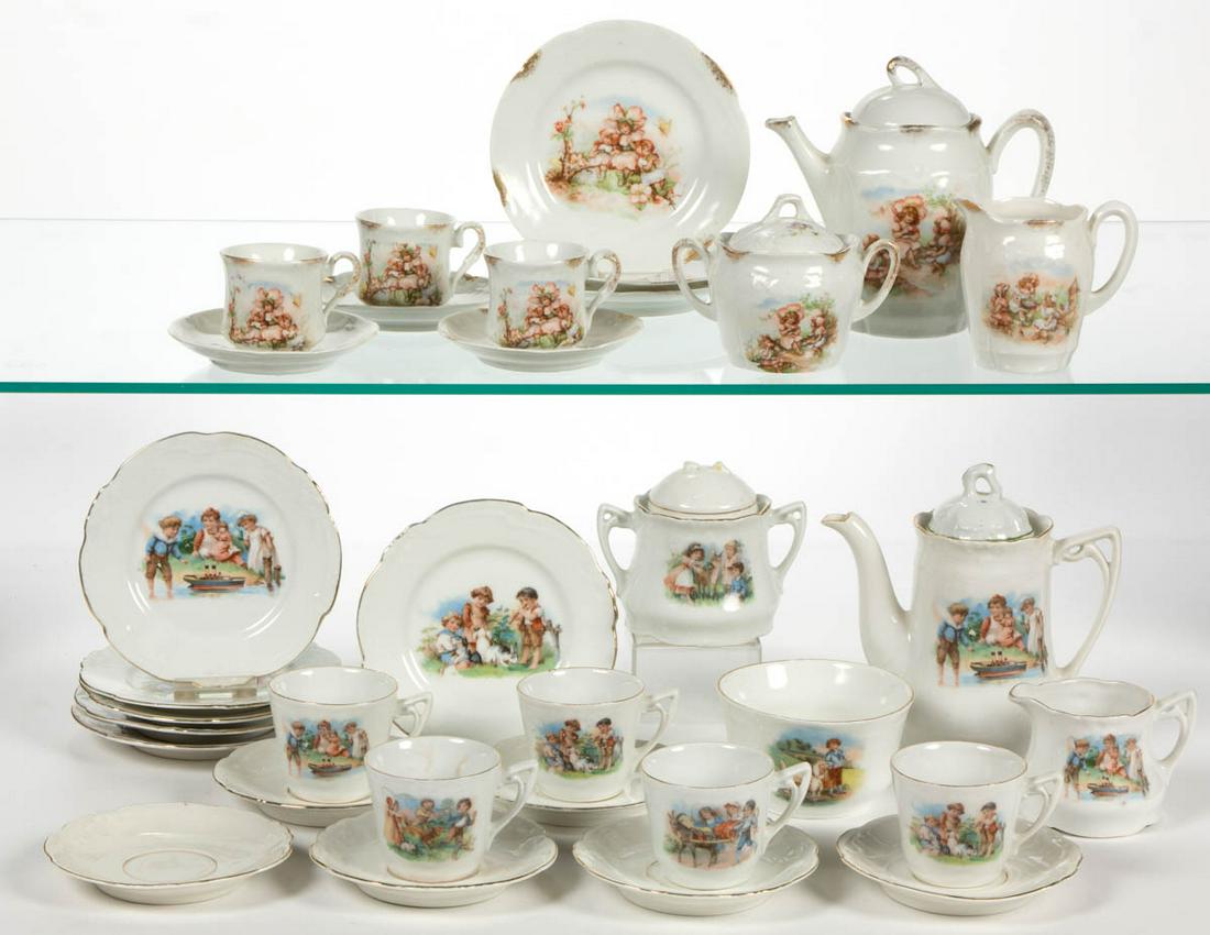 GERMAN PORCELAIN CHILD'S TEA SETS, LOT OF TWO: GERMAN PORCELAIN CHILD'S TEA SETS, LOT OF TWO, comprising a 12-piece set including a teapot, a creamer, a sugar with nonmatching cover together by association, three cup and saucer sets, and three 5 3