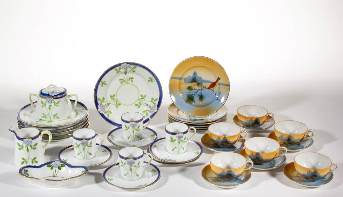 JAPANESE HAND-PAINTED PORCELAIN CHILD'S 18-PIECE: JAPANESE HAND-PAINTED PORCELAIN CHILD'S 18-PIECE PARTIAL TEA SETS, LOT OF TWO, comprising one set including a creamer, a covered sugar, four cups, five saucers, six 6" D plates, and a quatrefoil servi