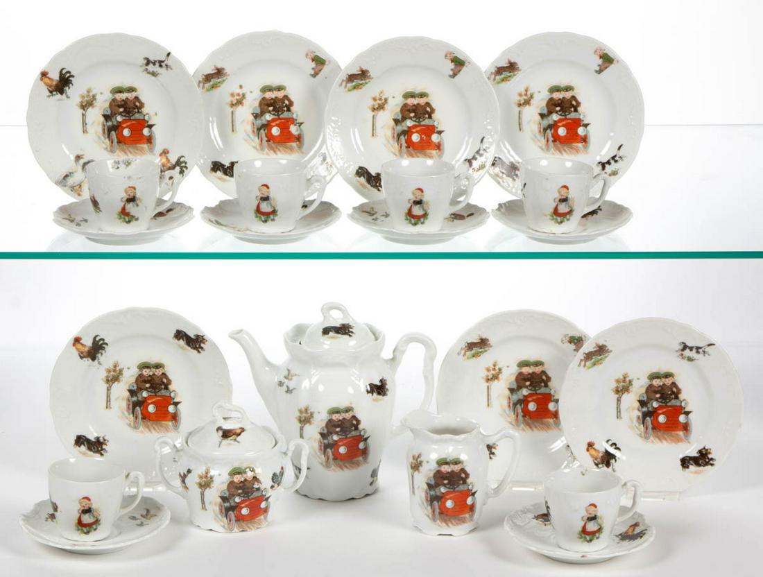 GERMAN PORCELAIN CHILDREN DRIVING MOTIF 22-PIECE: GERMAN PORCELAIN CHILDREN DRIVING MOTIF 22-PIECE CHILD'S TEA SET, comprising a teapot, a creamer, a covered sugar, six cup and saucer sets, and seven 5 1/4" D plates, each having polychrome decals fea