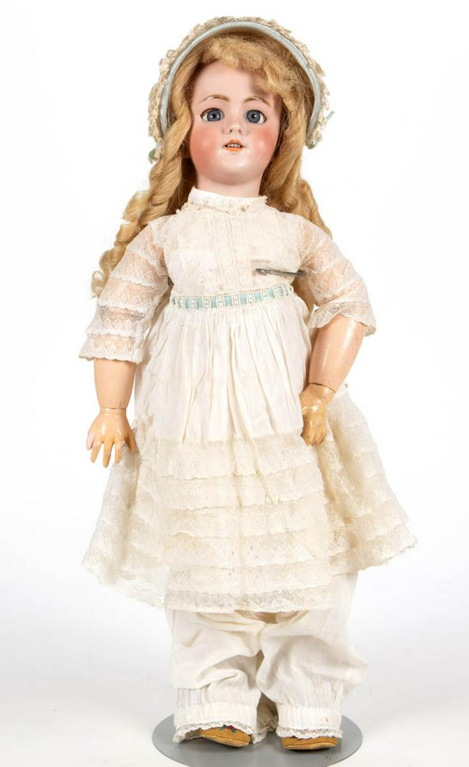 FRENCH BEBE JUMEAU BISQUE-HEAD CHARACTER GIRL DOLL: FRENCH BEBE JUMEAU BISQUE-HEAD CHARACTER GIRL DOLL, socket head, back with impressed "DEP / 9" and a red illegible stamp mark, probably Jeneau, sleepy-blue eyes, painted facial features including eyeb