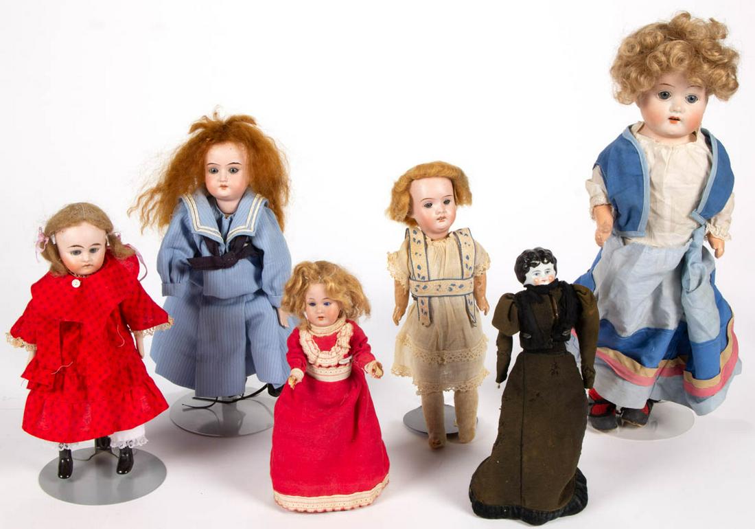 ASSORTED GERMAN BISQUE-HEAD GIRL DOLLS, LOT OF FIVE: ASSORTED GERMAN BISQUE-HEAD GIRL DOLLS, LOT OF FIVE, comprising a shoulder head Hermann Steiner example, sleepy-blue eyes, cloth and composition body; a socket head Armand Marseille No. 390, sleepy-bl
